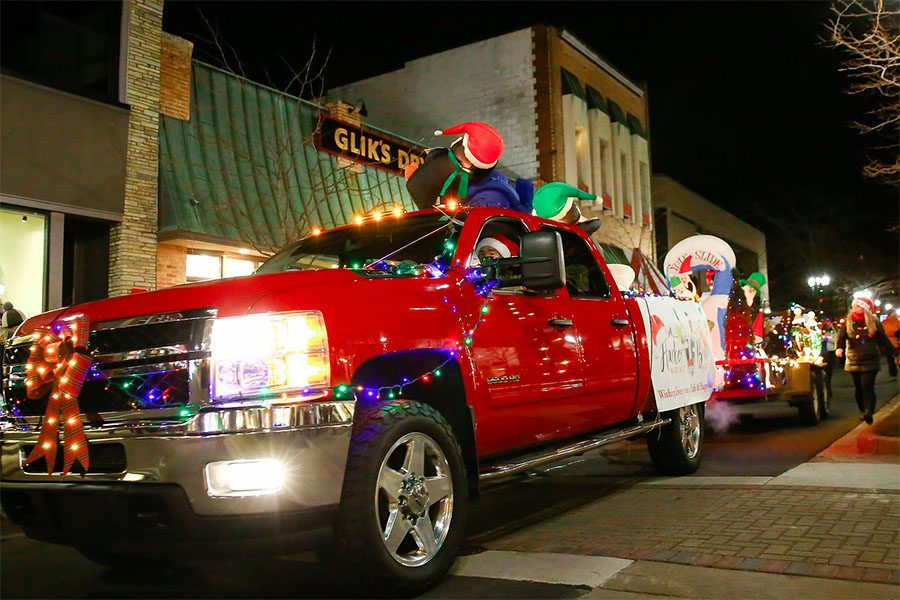Our Culture - Closeup View of Harbor Brenn Insurance Red Truck at Christmas Parade