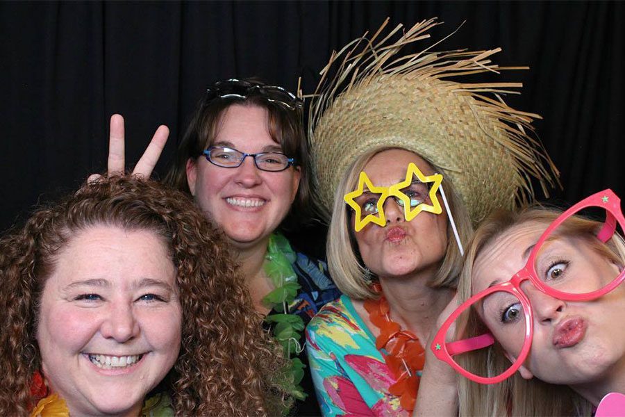 Our Culture - Harbor Brenn Insurance Staff Fun Picture with Hawaiian Shirts and Silly Glasses