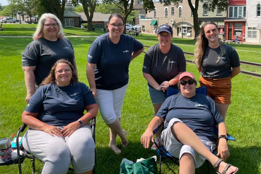 Our Culture - Portrait of Harbor Brenn Insurance Staff Relaxing at the Park